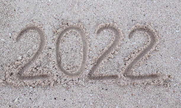 istock 2022 drawn in the sand. bright sunny photo. 1372538423