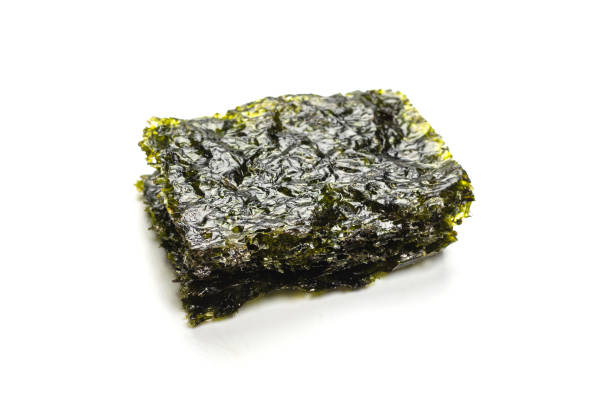 istock Tasty nori seaweed isolated on white. 1372538638