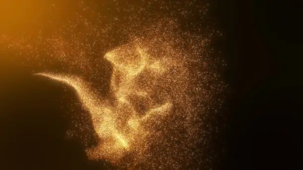 Photo of Orange gold  glow dust particles flowing.