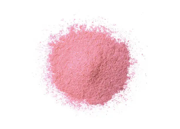 Pile of pink fruity protein powder isolated on white background. Top view. Flat lay.
