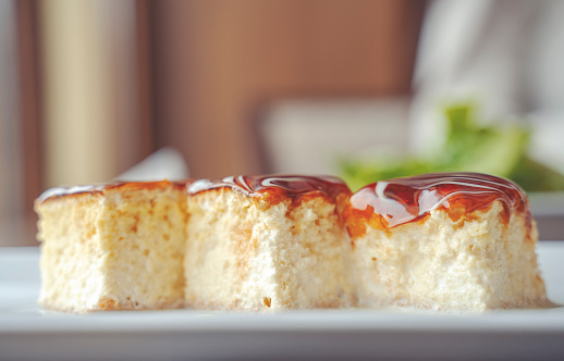 Trileche dessert in plate, slice of cake