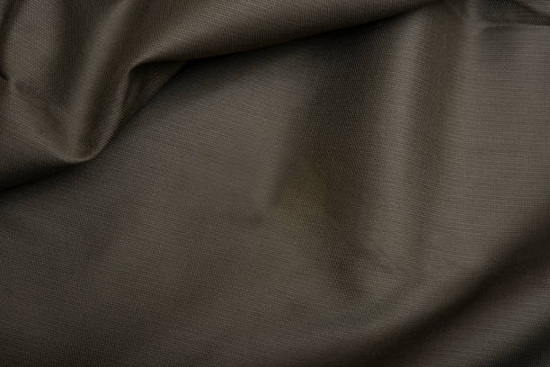 istock Closeup view of silk fabric making a background 1372557684