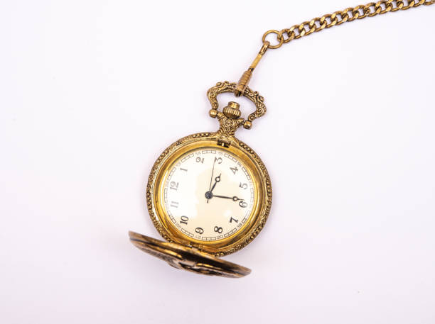 istock Ancient pocket watch isolated on white with golden chain 1372557706