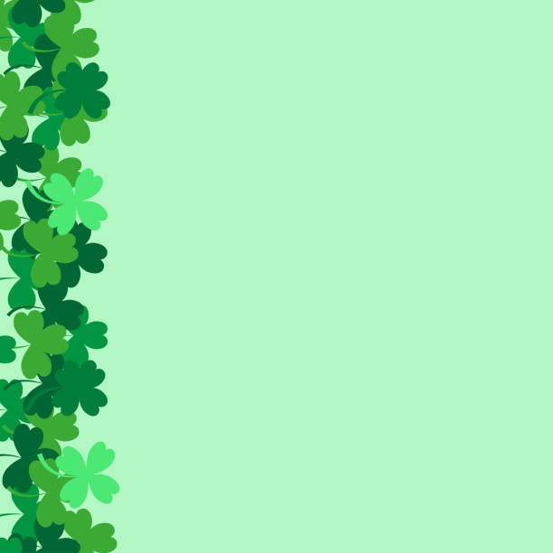 Frame of shamrocks on a green background on the left. Frame of shamrocks on a green background on the left. irish birthday blessing stock illustrations