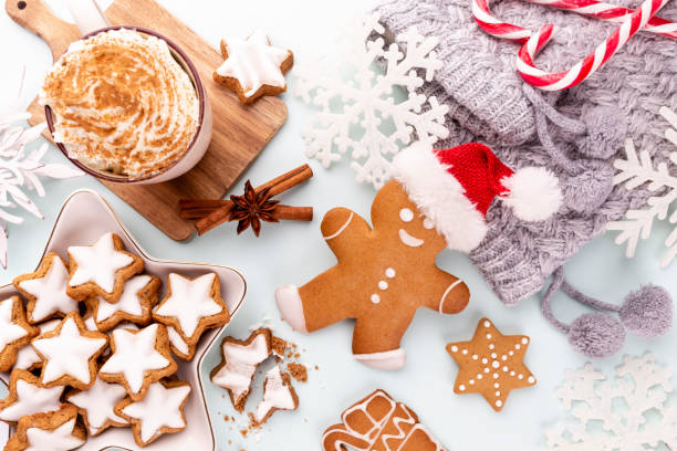 istock Gingerbread man, cookies and Christmas decor on pastel background. 1372557735