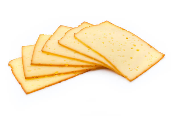 istock Cheese slices isolated on the white background. 1372558022