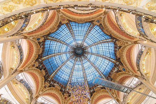 Paris, France - 14 February 2022: The large dome in Galeries Lafayette building in Paris, France