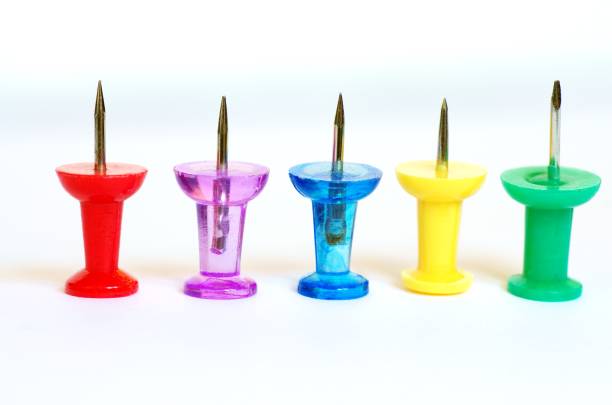 istock Five colorful pins in a row 1372561899