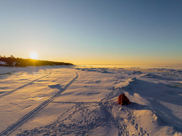 Camping on a frozen lake