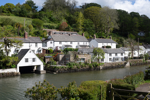 Riverside dwelling in Helford with boathouse.