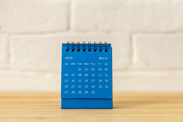 istock Desktop calendar for March 2022 on a light background. 1372569415