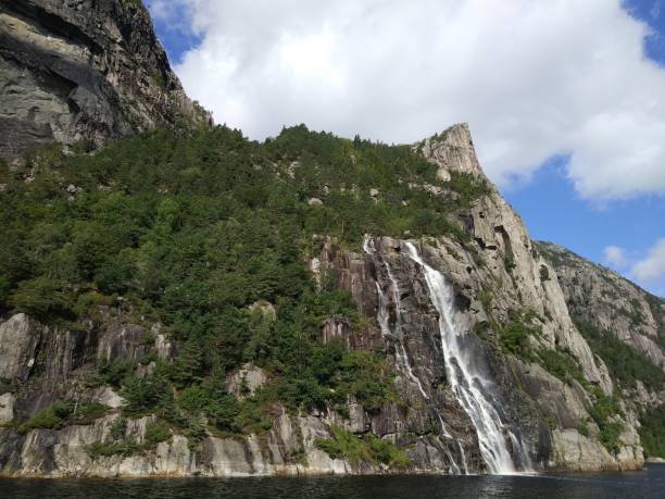 istock Beautiful Norwegian mountains, waterfall and cliffs in the Lysefjord, Norway. 1372573209