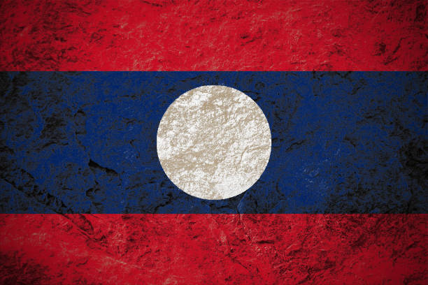 Lao People's Democratic Republic flag on stone background stock photo