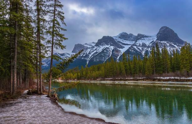 istock Moody Clouds Over The Canmore River Valley 1372582327