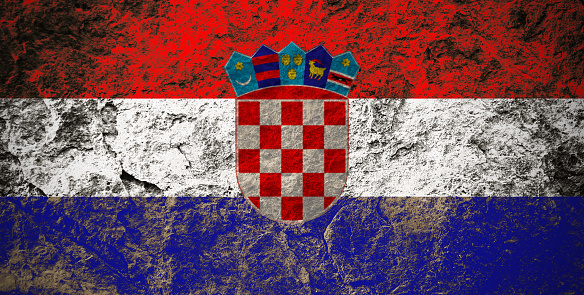 Republic of Croatia flag on grunge stone background