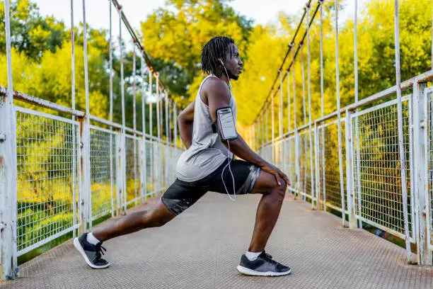 Photo of Sporty man exercising outdoor