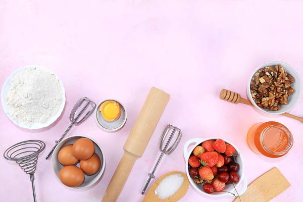 istock Kitchen background, cooking, Strawberry cherry pie recipe. Eggs, flour, sugar, strawberries and honey, top view, flat lay. Bakery background, modern bakery concept 1372589866