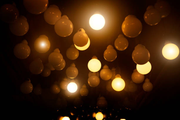 vintage bulb light on roof in dark room