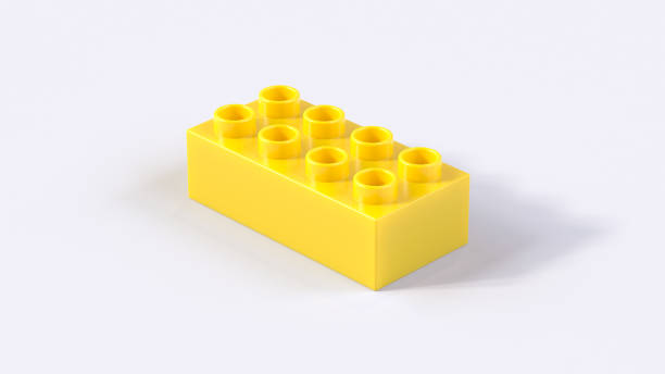 istock Perspective View of a Yellow Plastic Toy Brick on a White Background. 1372591887