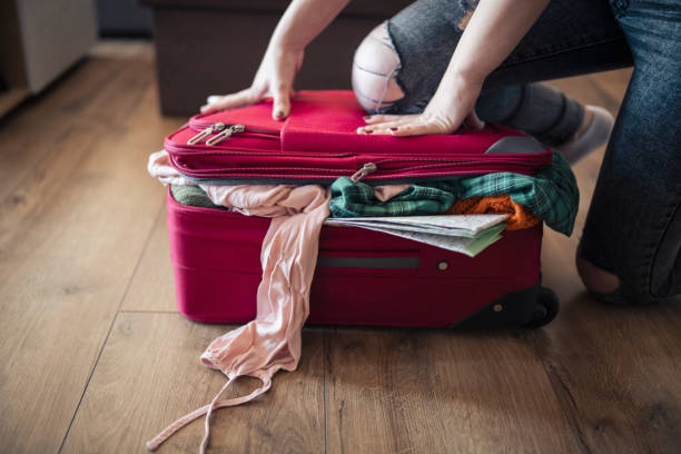 istock Struggling with the full luggage. 1372596500