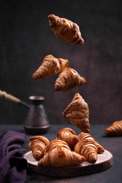 Croissant is a traditional French pastry. Levitation food stock photo