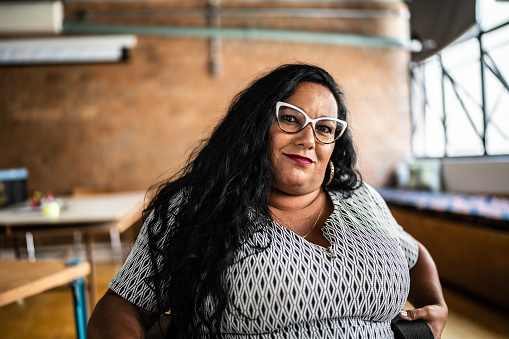 Portrait of disabled mature woman in a wheelchair