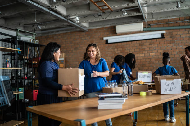 istock Volunteers arranging donations in a community center 1372606810