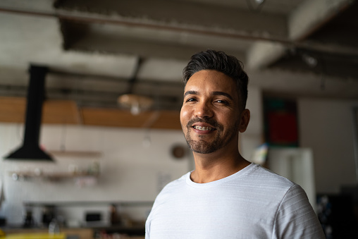 Portrait of a mid adult man at home