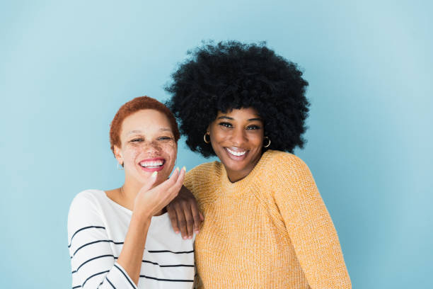 istock Female models pose for photo in studio 1372613424