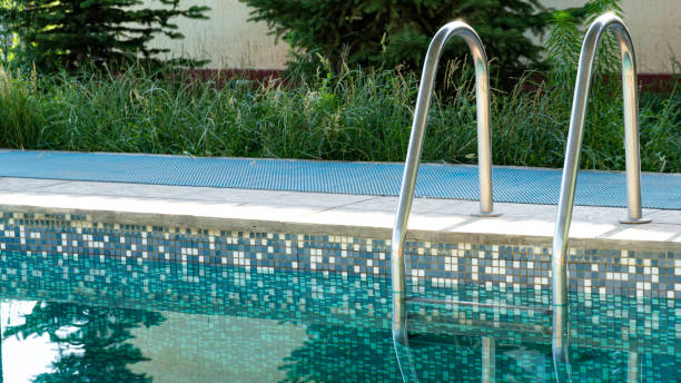 istock swimming pool with clean clear water. summer vacation concept. 1372613646