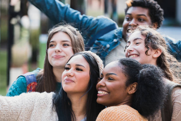istock Teenage friends pose for selfie 1372615098