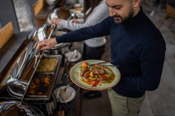 istock Man at hotel restaurant buffet 1372615307