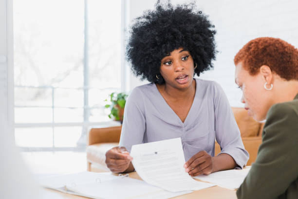 istock Manager meets with coworker 1372615605