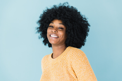 The gorgeous young adult provides a confidence emotion in her headshot photo.