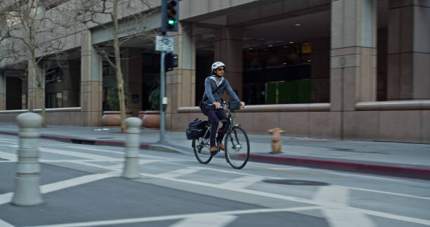 istock E-Bike Commuter Riding to Work in Separated Bicycle Lane 1372618749
