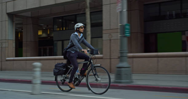 istock Cyclist Riding E-Bike in Separated Bicycle Lane 1372618754