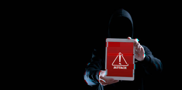istock Hacker tablet cyber security. Digital mobile phone in hacker man hand isolated on black banner. Internet web hack technology. Data protection, secured internet access, cybersecurity. 1372618918
