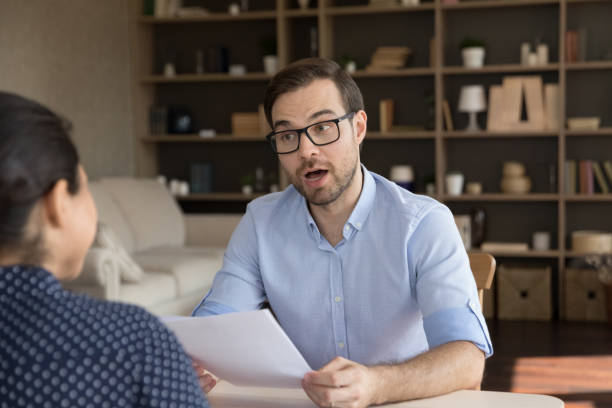 istock Excited employer asking job candidate about resume 1372619017