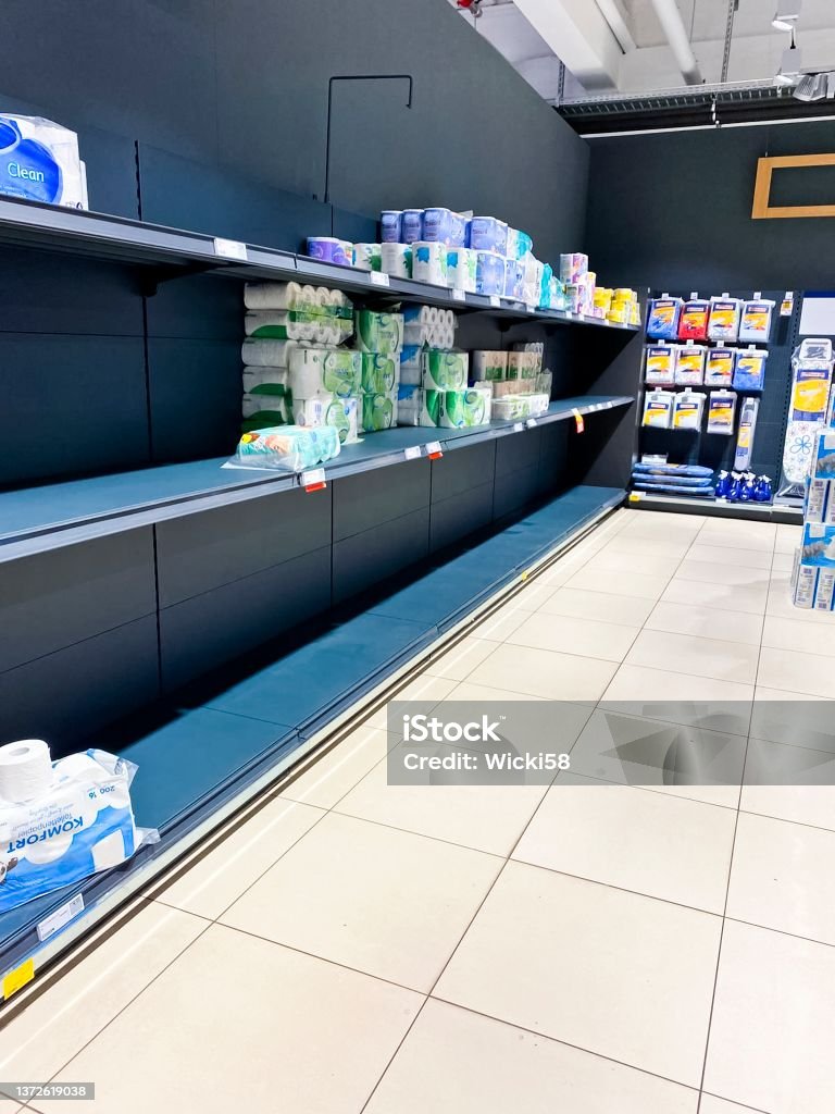 Empty shelves in a supermarket in the toiletries department Empty shelves in a supermarket in the toiletries department , toilet paper, paper towels, tissues, diapers and much more is missing.
This image is part of a supermarket series. Sold Out Stock Photo