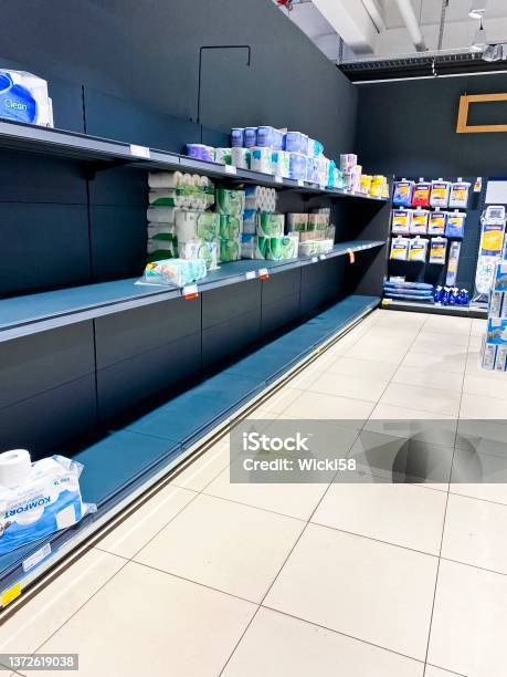 Empty Shelves In A Supermarket In The Toiletries Department Stock Photo - Download Image Now