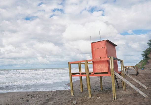 istock shelter for lifeguards on a lonely beach. Cloudy sky. copy-space 1372621516