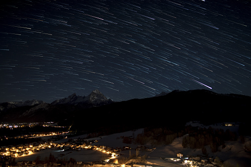 Startrails above Berchtesgaden with the mountain Watzmann in the background, Bavaria, Germany