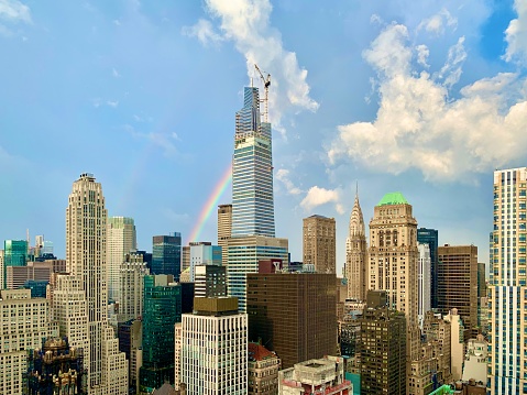 An eastern view of midtown Manhattan, with an added rainbow (or two!) to brighten the skies