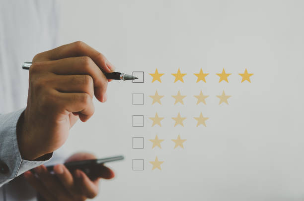 istock Customer service concept excellent service for satisfaction five star rating with business man touch screen with pen. 1372633109