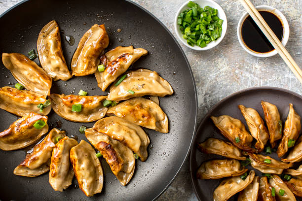 Seafood and pork dumplings on table