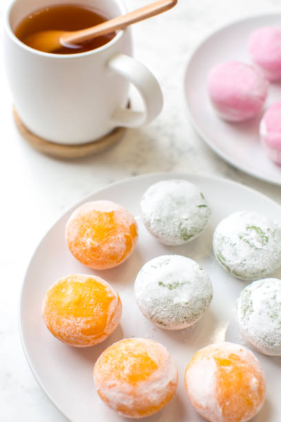 istock Mochi ice cream with green tea on table 1372635574
