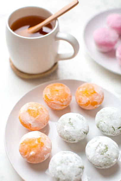istock Mochi ice cream with green tea on table 1372635582