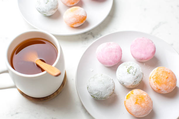 istock Mochi ice cream with green tea on table 1372635595
