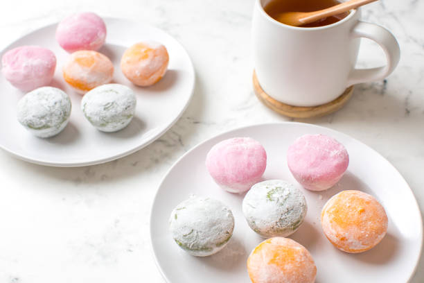 istock Mochi ice cream with green tea on table 1372635602