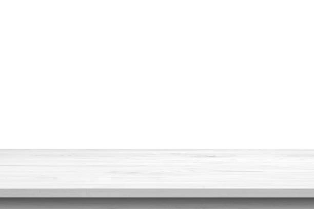 istock Empty white wooden table top isolated on white background 1372638053